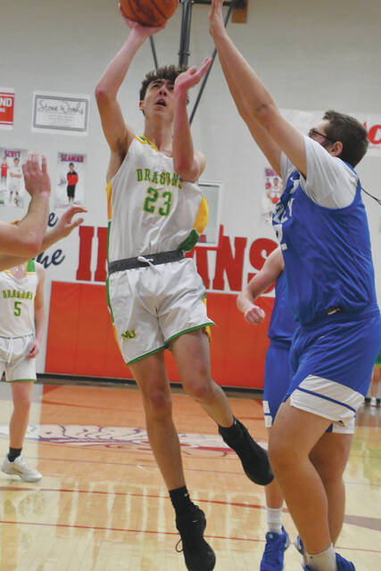 131087888_web1_LoganCaldwell
West Unions Logan Caldwell (23) floats through the lane on a shot attempt as the Dragons faced Ripley in the November 22 Southern Hills Athletic Conference Boys Basketball Preview. (Photo by Mark Carpenter)