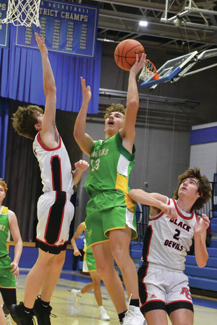 131143815_web1_Knox
West Unions Tegan Knox earned Player of the Game honors for his 21-point performance in the Dragons 68-29 win over Robertson County on December 14. (Photo by Mark Carpenter)