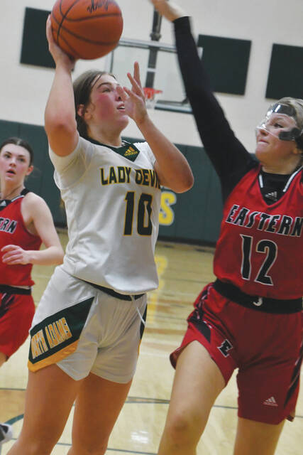 131257095_web1_Pistole
North Adams Emma Pistole puts up a shot from close range in the Lady Devils 42-29 win over Eastern brown on January 30. Pistole scored 12 points in the victory. (Photo by Mark Carpenter)