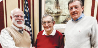 
			
				                                Chris Harover(left) assumed the role of President at The National Bank of Adams County follwoing the retirement of Robert Smith(middle), and Randy Sininger assumed the role of Executive Vice President formerly held by Harover.
 
			
		