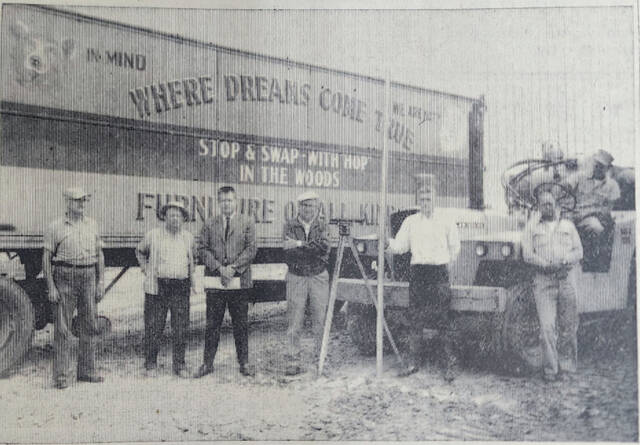 131346865_web1_Archive3-12
Groundwork for the new shopping center near Peebles was continued Friday with the above men playing a vital role in its development. They are, ledt to right, Lawrence Tracy, an employee of Hops for 32 years; Steward Hopping, David D. Wilson, representing Wilson, Wilson and Wilson law office; Robert Satterfield, engineer; William Brodt, Mr. Satterfields aid, Jack Harris, constructionist and Russell Branham, construction contractor.