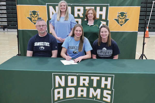 131379914_web1_BoergerSigning
Present for the March 12 signing ceremony at NAHS were: Front row, from left, Karl Boerger (father), Katelynn Boerger and Kelly Boerger (mother); Back row, from left, Devan Spriggs (Shawnee State Womens Volleyball Head Coach) and Katie Ragan (NAHS Varsity Volleyball Coach ). (Photo by Mark Carpenter)
