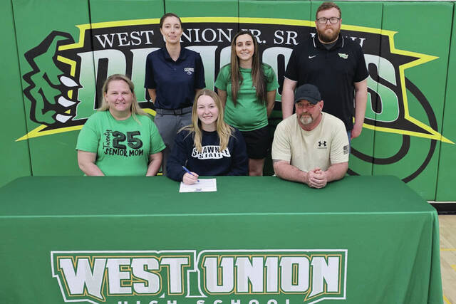131404669_web1_LewisSigning
Present for the March 14 signing at WUHS were: Front row, from left, Lisa Gannon-Lewis (mother), Olivia Lewis and Chad Lewis (father); Back row, from left, Erika Martin (SSU Womens Assistant Golf Coach), Marci Nehus (WUHS Girls Golf Coach) and Ethan Stricklett (WUHS Athletic Director). (Photo by Mark Carpenter)