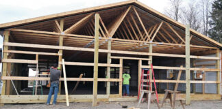
			
				                                Workers with the A-1 Building Company were seen Monday, April 21, at the site of the new Adams County Dog Pound on SR41 in West Union. The new building will be able to house 40 dogs and will feature inside/outside kennels that allow the animals access to the outdoors while providing adequate shelter during inclement weather. (Photo by Ryan Applegate)
 
			
		
