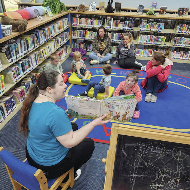 131466785_web1_Library-4
Peebles Library Programmer Sabrena is captured reading a story during Easter Storytime! Children also enjoyed crafting their own paper Easter baskets, going on a fun Easter Egg Hunt, and exploring themed items in our sensory bin.