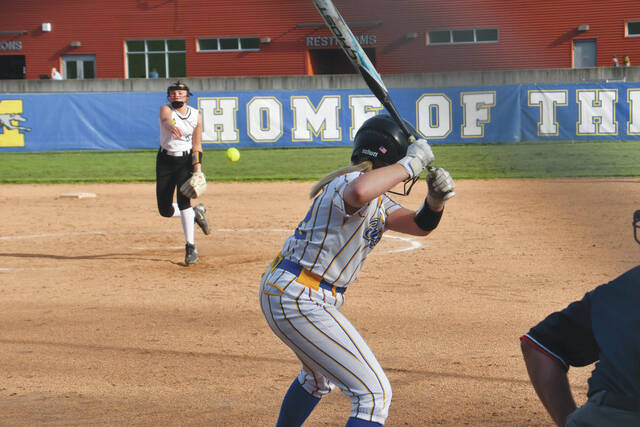 131470862_web1_Garrison-Young
Two of the best in the Southern Hills Athletic Conference face off as North Adams Carlee Garrison delivers a pitch to Manchesters Rylie Young as the two teams met in conference play on April 22. Garrison got the best of things that day, throwing a no-hitter in a 5-0 Lady Devils win. (Photo by Mark Carpenter)
