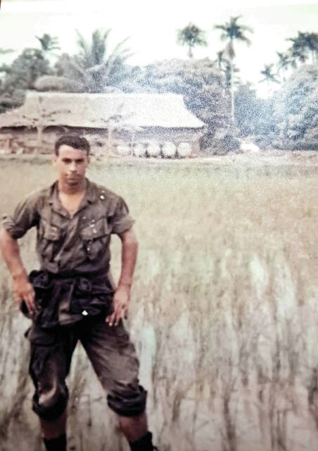 131523566_web1_Willard-Wallace
A ceremony will be held in Peebles on Thursday, May 22, celebrating the recent memorialization of a portion on SR 781 in honor of Willard Boston Wallace who made the ultimate sacrifice. This photo depicts Wallace in a field in South Vietnam. (Photo Courtesy of Roxanne McCoy)