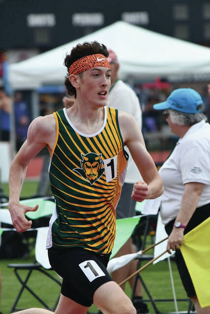 131571161_web1_Beau-State-1
Down the backstretch, North Adams Beau Hesler leaves the competition behind on his way to winning the Division III state championship in the Boys 800 M Run. (Photo by Danielle Jodrey)