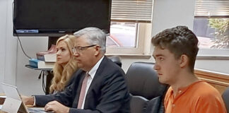 
			
				                                Brian Moser (right) was arraigned on Thursday, July 3 in Adams County Court and charged with involuntary manslaughter and endangering children. Adams County Prosecuting Attorney Aaron Haslam(middle) and Assistant Prosecuting Attorney Randalyn Worley(left) are handling the case. (Photo by Ryan Applegate)
 
			
		