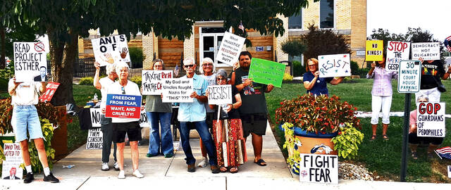 131721781_web1_Protest-West-Union
A small group of protesters gathered in front of the Adams County Courthouse on Friday, August 15. (Photo by Ryan Applegate)