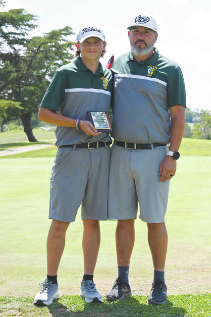 <p>North Adams senior golfer Christopher Hall, left, with new head coach Hannum Taylor, right, after this year’s Adams County Cup tournament. (Photo by Tim Daulton)</p>