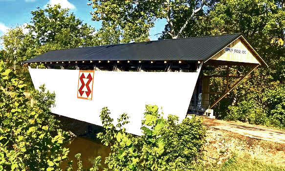 131787312_web1_Kirker-Covered-Bridge-New-Roof
The Kirker Covered Bridge near West Union now sports a brand-new roof, completed September 5, 2025, marking the first major step in restoring the historic landmark following tornado damage in April 2024. (Photo Courtesy of Adams County Travel and Visitors Bureau)