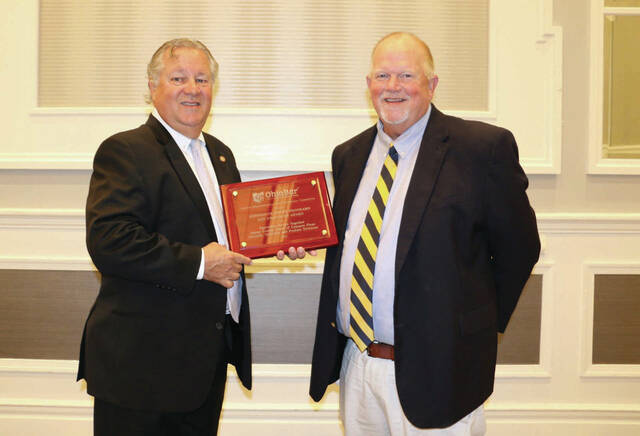 131811235_web1_SpencerHonored
from left, President Bill Chris and Judge Brett Spencer