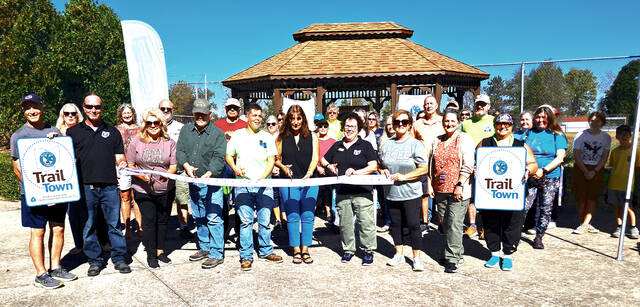 131835398_web1_Peebles-Trail-Town-Oct-1
Community members, volunteers, and Buckeye Trail Association representatives take part in a ceremonial ribbon cutting in Peebles on Wednesday, Oct. 1, 2025, celebrating the villages official designation as the 22nd Buckeye Trail Town. (Photo by Ryan Applegate)
