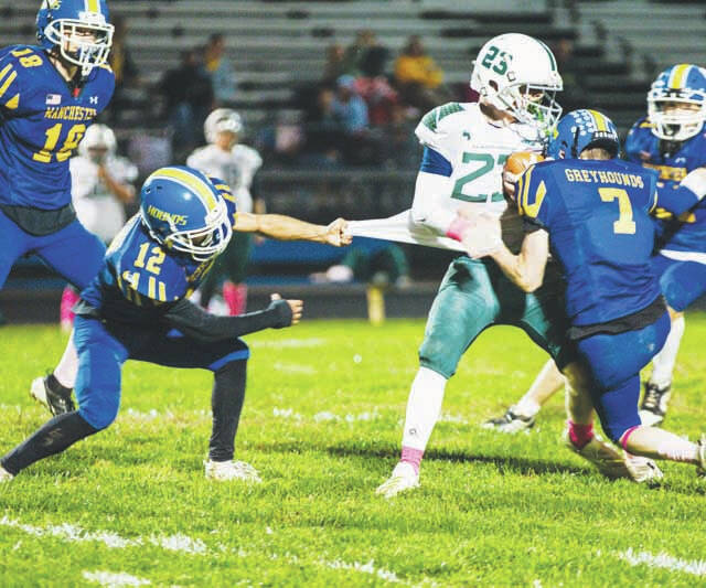 131849832_web1_MHS-NA-1 
			
				                                Manchesters Amillion Brown (12) hangs on to the jersey of North Adams Camren Childress (23), trying to make a tackle during last Friday nights battle at Veterans Stadium. (Photo by Sarah Wilson-Dinsmore)