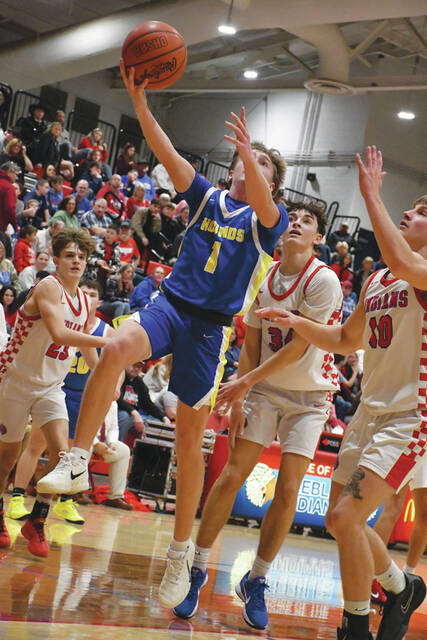 <p>In spite of a one-sided defeat, Manchester’s Parker Hayslip led all scorers with 24 points as the Greyhounds fell at Peebles on December 5. (Photo by Mark Carpenter)</p>