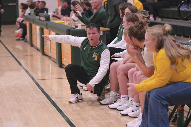 132050761_web1_Davis-403
with his teams 57-27 win over Ironton on January 9, Coach Rob Davis from North Adams became Adams Countys all-time winningest coach in high school basketball history, girls or boys, getting his 403rd career victory. (Photo by Tim Daulton)