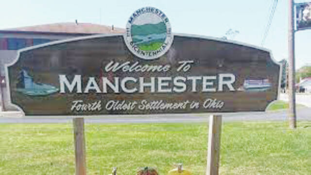 132087584_web1_ManchesterSign