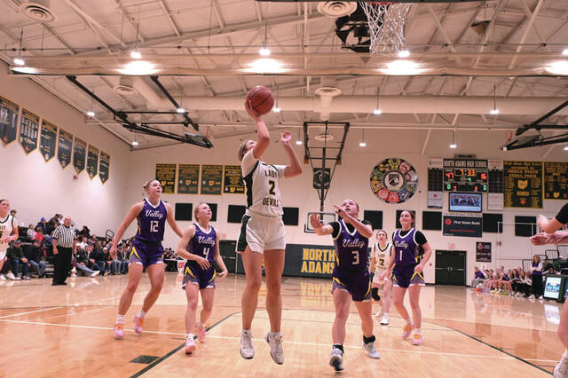 Last week was a memorable one for North Adams junior Emma Pistole (2). In four non-conference wins for the Lady Devils, Pistole averaged over 23 points a game as North Adams finished the regular season at 17-5. (Photo by Tim Daulton)