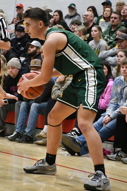 North Adams got 16 points from guard Thaddeus Moore in their loss at Fairfield on February 17. (Photo by Mark Carpenter)