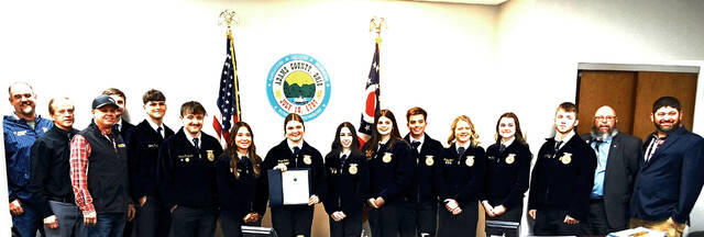 FFA members from North Adams, Peebles, Manchester, West Union, and the Ohio Valley CTC, along with agricultural instructors from the CTC and Manchester chapters, gathered at the Adams County Commissioners meeting as the commissioners issued the 2026 proclamation recognizing National FFA Week. (Photo by Ryan Applegate)