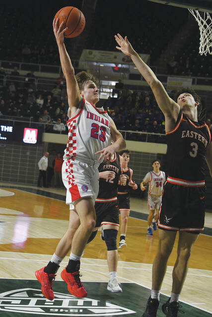 Peebles sophomore Bo Johnson came up big in the clutch for the Indians in the final minutes, scoring 18 points in the Peebles 56-54 win over Eastern Pike in a Division VI district championship game. (Photo by Mark Carpenter)