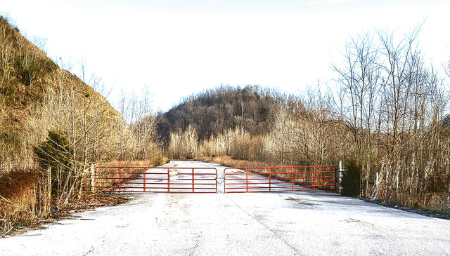 The access road leading into the Buck Canyon property is shown from U.S. Route 52, where recent activity has drawn community attention as discussions continue about potential large‑scale development in the area. (Photo by Ryan Applegate)