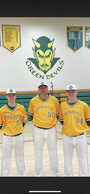 Rob Meade with his second set of twins, Seth and Cade.