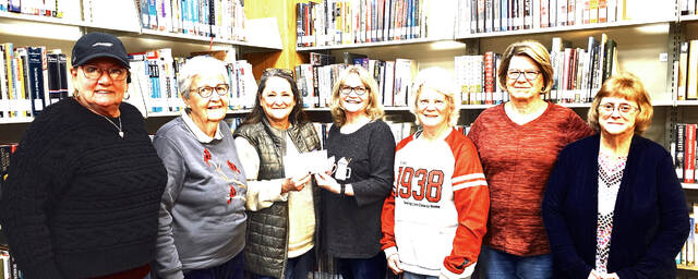 Members of Friends of North Adams Public Library receive a $500 mini grant donated by Holly Johnson, awarded through AEP Ohio in recognition of her volunteer service. (Submitted photo)
