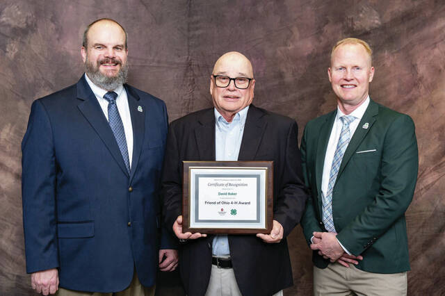 From left, Jeff McCutcheon, Interim State 4-H Leaders; David Baker; Joel Oney, President, Ohio 4-H Foundation. (Photo provided)