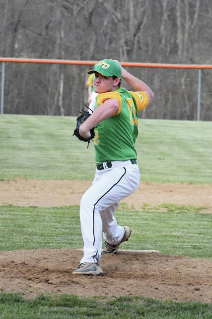 West Unions Thomas Barnhart delivers a pitch to the plate during the Dragons SHAC match up with Manchester on March 31. (Photo by Mark Carpenter)