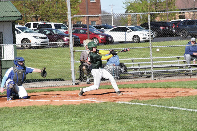 In a 29-2 win over Ripley on April 7, North Adams senior Colin Tolle put his name in the OHSAA record boos as he banged out six hits to lead the Green Devils offense. (Photo by Mark Carpenter)