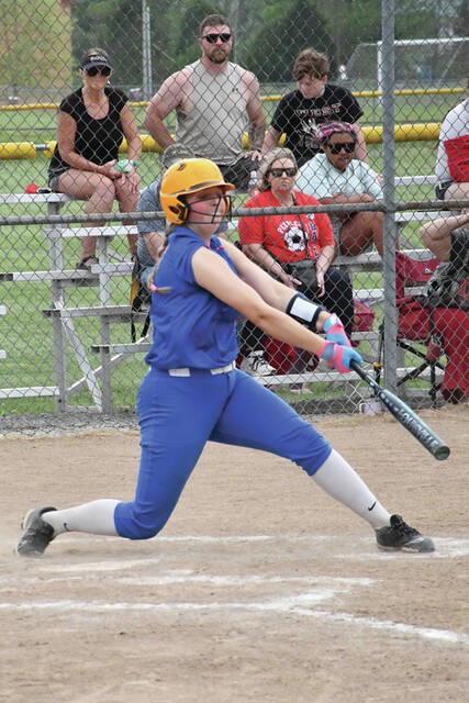 This rip by Peebles Kendall Myers produced the fifth inning run batted in that tied the score in the Lady Indians April 18 win over Manchester. (Photo by Mark Carpenter)