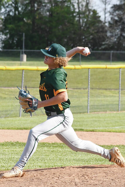 North Adams Trace Evans delivers a pitch plateward as he and the Green Devils battled rival Peebles on April 23. Evans was the tough luck loser in a 2-1 defeat, going six innings and striking out six Indians. (Photo by Mark Carpenter)