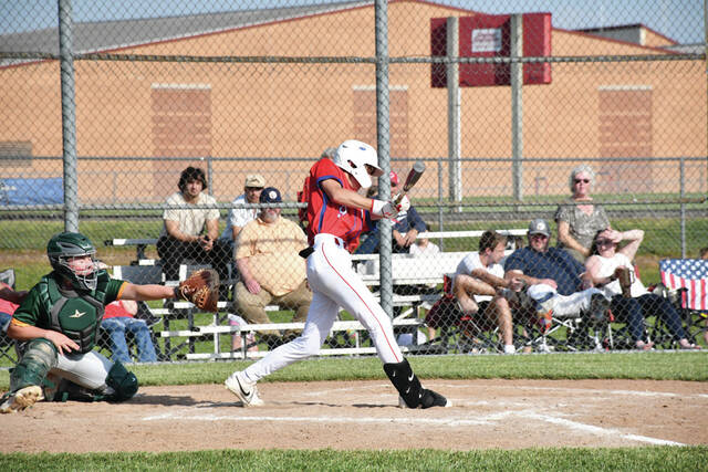 Peebles freshman and lefty-swinging Tyler Smith takes a hefty cut in action from The Tribes 2-1 victory over North Adams on April 23. Smith went 1 for 2 in the Peebles victory. (Photo by Mark Carpenter)