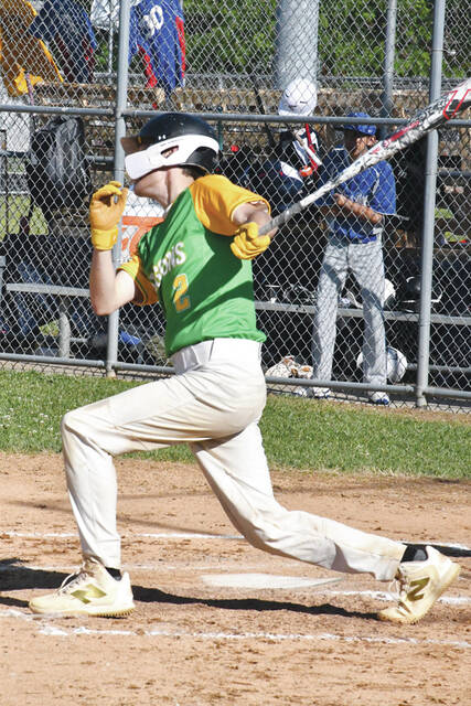 West Union leadoff hitter Matty Byron follows through on a swing in the Dragons big win at Ripley. Byron had a big day at the dish, going 2 for 4, scoring four runs and driving home four more. (Photo by Mark Carpenter)