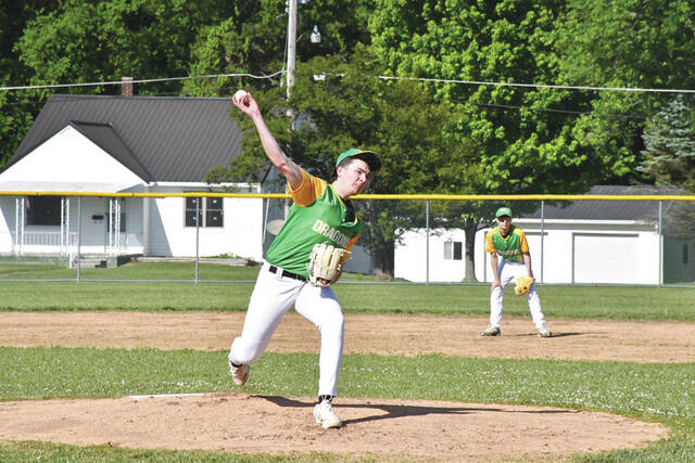 West Unions Nate Fooce delivers his first pitch in the bottom of the first inning in the Dragons 25-4 win at Ripley on April 30. Fooce was the winning pitchers in the Dragons second dominant win over Ripley this spring. (Photo by Mark Carpenter)