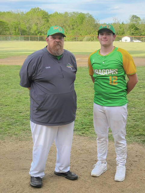 West Union sophomore Thomas Barnhart, right, set the schools single-game strikeout record on May 8 when he mowed down 17 Eastern brown Warriors. At the left is West Union head coach John Shelton (Photo provided)