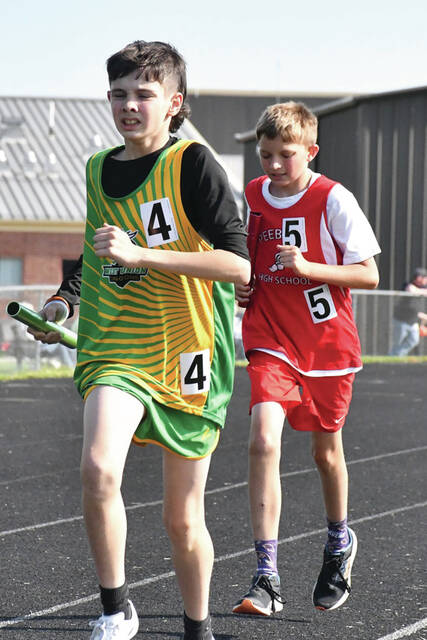 Junior High Boys 4 x 800 Relay (Photo by Mark Carpenter)