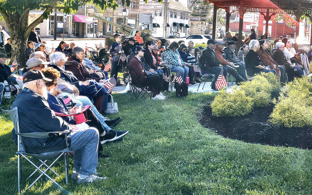 Community members gather on the Adams County Courthouse square in West Union on May 7 for the 2026 National Day of Prayer observance featuring worship music, prayer and remarks from local speakers and church leaders. (Photo by Ryan Applegate)