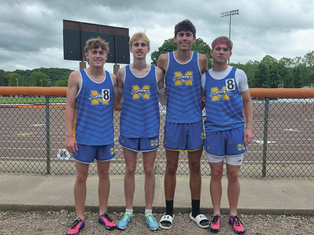 In qualifying for this weeks Division V Regional Meet, the Manchester Boys 4 x 800 relay team broke the school record with their time of 3:38.65. From left, Parker Hayslip, Ryan Mack, Ryan Butcher-Raines and Joel Blythe. (Photo provided)