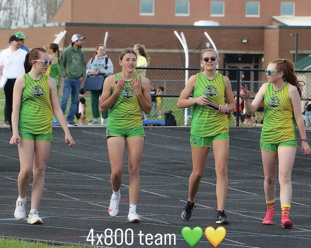 (The West Union girls 4 x 800 relay team won a Division IV district championship last week with their personal best time of 10:37.21. From left, Tabitha Armstrong, Emma Crawford, Ella Shupert and Lydia Armstrong. (Photo provided)