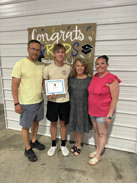 From left, Aaron Lockhart, Joel Blythe (Scholarship Recipient), Jenny Lockhart and Kara Kingsolver.