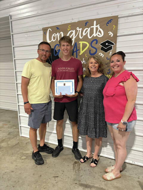 From left, Aaron Lockhart, Elijah Crabtree (Scholarship Recipient), Jenny Lockhart and Kara Kingsolver.