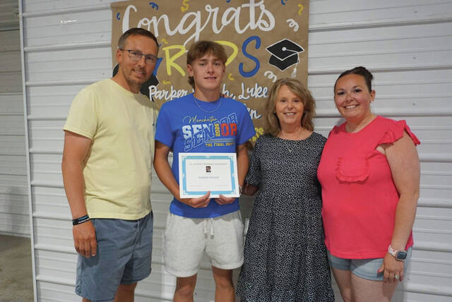 From left, AAron Lockhart, Parker Hayslip (Scholarship Recipient), Jenny Lockhart and Kara Kingsolver.