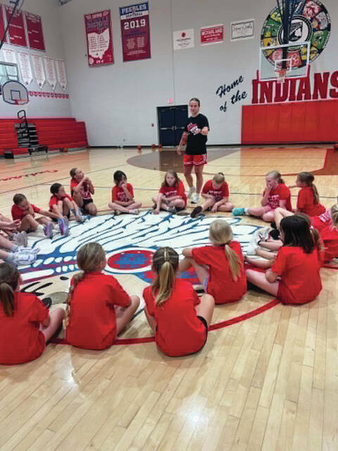 Peebles graduate and current Rio Grande womens basketball standout Payton Johnson speaks to campers at the recent Lady Indians Pee-Wee Basketball Camp. (Photo provided)