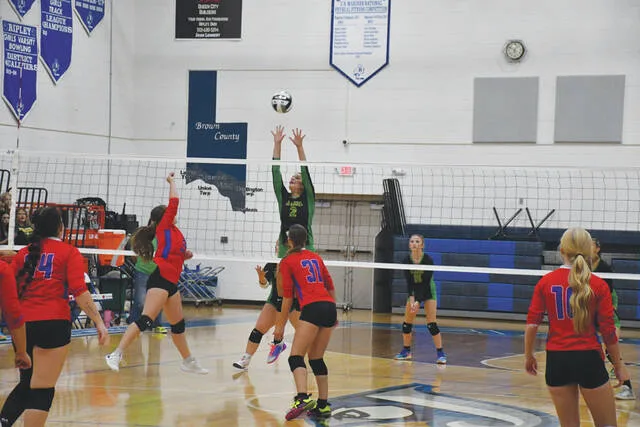 West Union and Peebles split their two set of action at the SHAC Volleyball Preview, hosted on August 7 by Ripley High School. (Photo by Mark Carpenter)