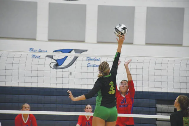 West Unions Jocelyn Hall gets the kill in the Lady Dragons match up with Peebles in the SHAC Volleyball Preview. (Photo by Mark Carpenter)