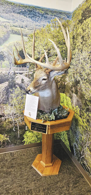 A display on the Restitution Buck can be found in the lobby of the new Adams County Welcome Center. (Photo by Mark Carpenter)